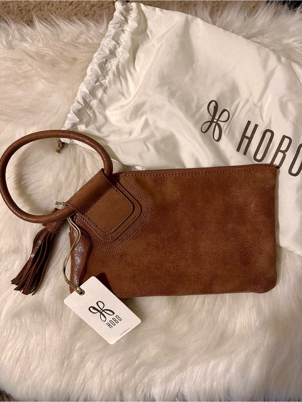HOBO Buffed Leather Wristlet with Ring Handle and Tassel. NWT